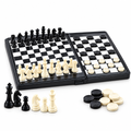 Open folding chessboard with chess pieces and draughts counters on a white background